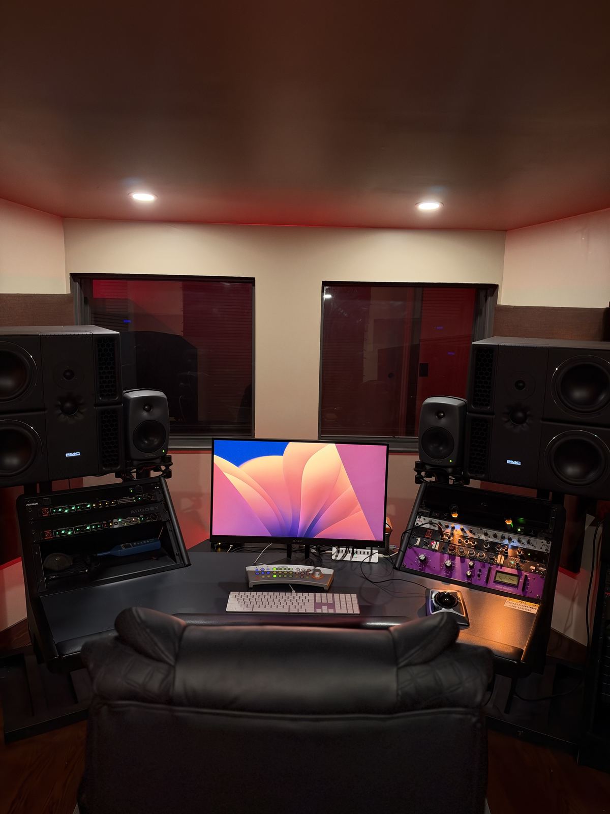 Room A — control room with large main monitors